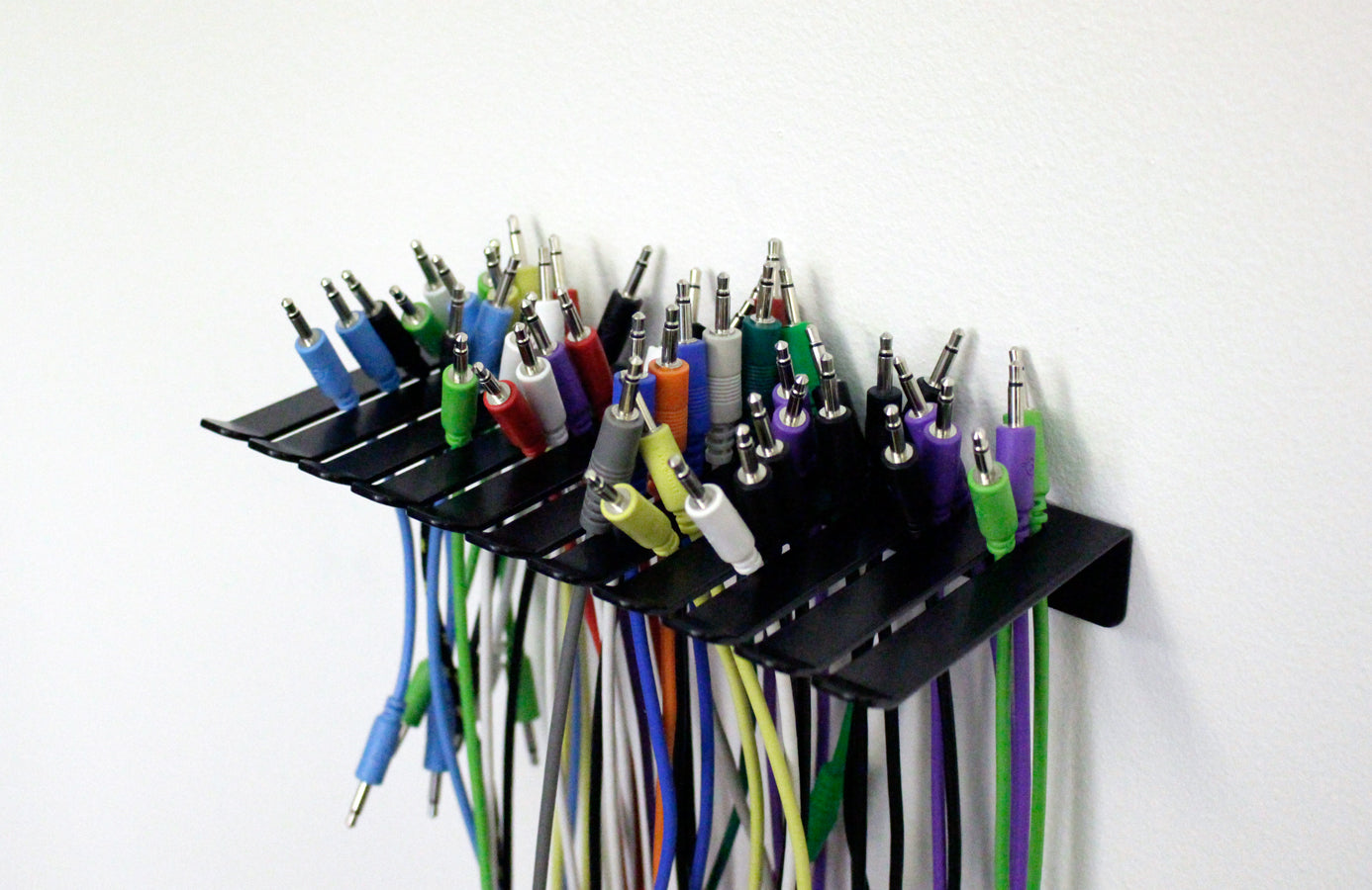Eurorack cable holder